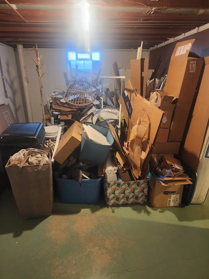 Roll-off dumpster container at job site for 6 Yard Dumpster Rental in Clinton